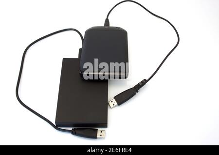 Two external hard disks on the white background. Data storage. Stock Photo