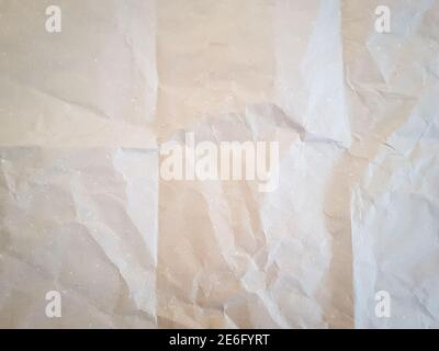 Old natural crumpled craft paper texture closeup Stock Photo