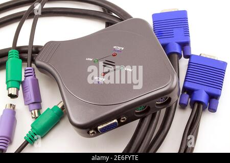 Compact automatic CPU switch. Isolated on a white background. Closeup. Stock Photo
