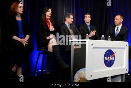 University of Liege (Belgium) astronomer Michael Gillon (2nd,R) makes remarks as (L-R) Space Telescope Science Institute astronomer Nikole Lewis, MIT Professor of planetary science and physics Sara Seager, Sean Carey of NASA's Spitzer Science Center and Associate Administrator for NASA's Science Mission Directorate Thomas Zurbuchen listen during a news conference, to present new findings on exoplanets, planets that orbit stars other than Earth's sun, in Washington, U.S., February 22, 2017.                             REUTERS/Mike Theiler
