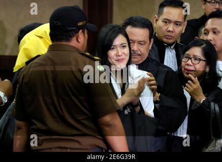 Jessica Kumala Wongso C Who Is Accused Of Murdering Her Friend By Poisoning Her Coffee With Cyanide Gestures After Her Trial At The Central Jakarta Court In Jakarta Indonesia October 27 2016 Shadows Caused By Multiple Flashes From Different Sources