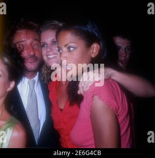 Santa Monica, California, USA 2nd May 1996 Singer Rod Stewart, wife model Rachel Hunter and model Veronica Webb pose backstage at 10th Annual California Fashion Industry Friends of APLA Project Los Angeles (APLA) Benefit Dinner and Fashion Show Honoring designer Todd Oldham on May 2, 1996 at Bergamont Station in Santa Monica, California, USA. Photo by Barry King/Alamy Stock Photo Stock Photo