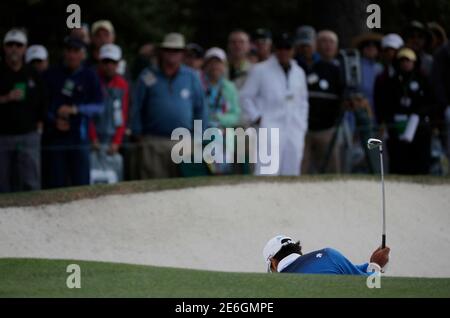 Hideki Matsuyama of Japan hits from a fairway bunker on the first hole in first round play during the 2017 Masters golf tournament at Augusta National Golf Club in Augusta, Georgia, U.S., April 6, 2017. REUTERS/Mike Segar