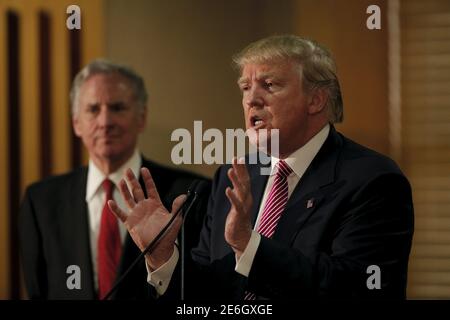 U.S. Republican presidential candidate Donald Trump speaks at a news conference while South Carolina Lieutenant Governor Henry McMaster looks on at the Hanahan Town Hall in Hanahan, South Carolina February 15, 2016.  REUTERS/Randall Hill