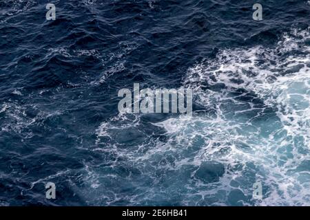 Ocean seen from above, close, waves, pattern strong and powerful. Stock Photo