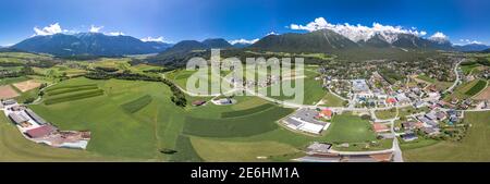 360 Panorama Aerial view of mieming mountain range in Obermieming valley village in Tyrol Austria Stock Photo