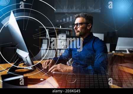 Financial And Marketing Data Analyst Man Using Computer Stock Photo