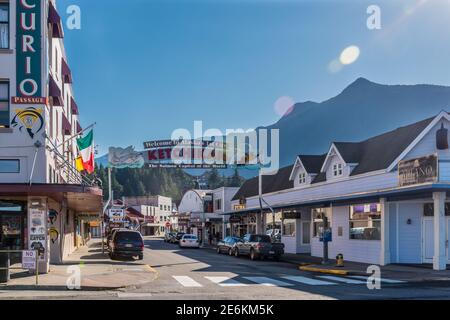 View of one of the main streets in Ketchikan, Alaska including the Welcome to Alaska's 1st City Ketchikan the Salmon Capital of the World sign . Stock Photo