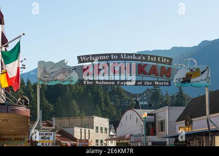 View of one of the main streets in Ketchikan, Alaska including the Welcome to Alaska's 1st City Ketchikan the Salmon Capital of the World sign . Stock Photo