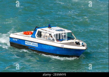 Police boat in the beautiful Italian city of Venice, Italy. Stock Photo