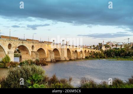 Medieval Palmas Bridge over Guadiana River in Badajoz, Extremadura, Spain Stock Photo