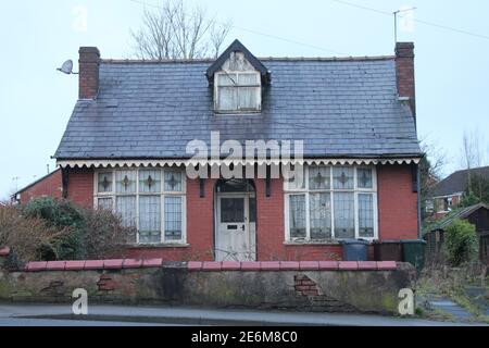 Run down bungalow in need of renovation concept Stock Photo