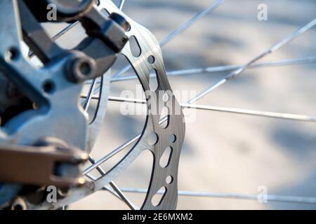 Used mountain bike disc brake close-up Stock Photo