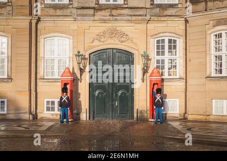 Copenhagen, Denmark - November 18 2017: A Danish Royal Life Guards stand on guard outside Amalienborg Palace, residence of the Danish Royal Family in Stock Photo