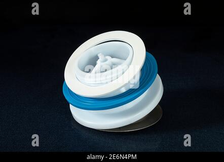 The Plastic siphon for sink on black background.Spare details for repair of the sink Stock Photo