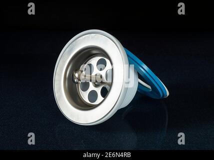 The Plastic siphon for sink on black background.Spare details for repair of the sink Stock Photo