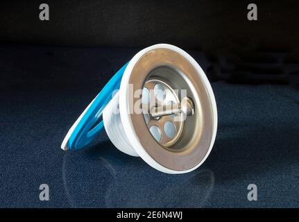 The Plastic siphon for sink on black background.Spare details for repair of the sink Stock Photo