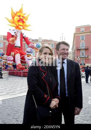 Christian Estrosi, President of the Provence Alpes Cote d'Azur region (PACA), poses with his wife Laura Tenoudji Estrosi during the 133rd Nice carnival, the first major event since the city was attacked during Bastille Day celebrations last year, in Nice, France, February 11, 2017.   REUTERS/Eric Gaillard