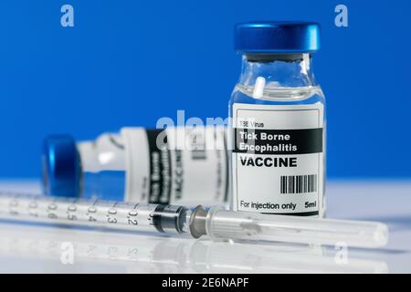 tick borne encephalitis TBE virus vaccine vials and syringe Stock Photo