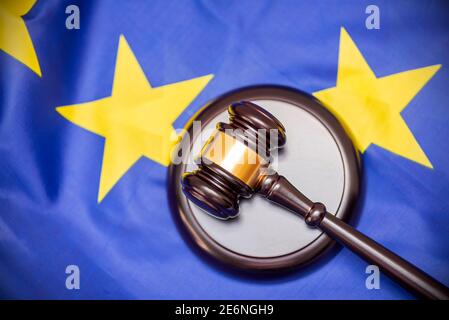 Flag of European Union and judges wooden gavel on the top, concept picture about court and justice