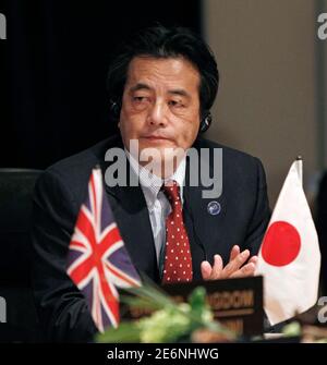 Japan's Foreign Minister Katsuya Okada attends a meeting during the G8 foreign ministers' meeting in Gatineau, Quebec March 30, 2010.       REUTERS/Chris Wattie       (CANADA - Tags: POLITICS)