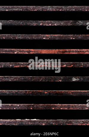 Rusty metal rods isolated on black background poverty prison age retro concept Stock Photo