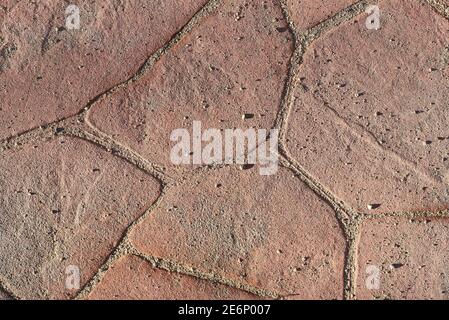 Tiled yellow brown aged dusty stone floor Stock Photo