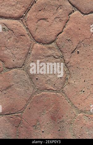 Tiled yellow brown aged dusty stone floor Stock Photo