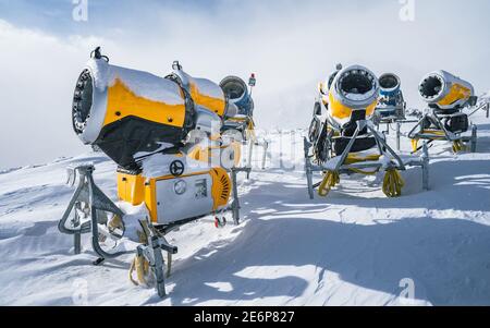 Snow cannon gun or machine sprays water and snowes a ski or cross-country  track 27596714 Stock Photo at Vecteezy