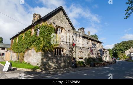 Sunny Summer view of the Buck Inn in the centre of the Yorkshire Dales village of Malham Stock Photo