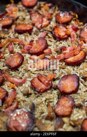 Close up of tradicional portuguese dish Arroz de Pato with rice, duck, bacon and chorizo Stock Photo