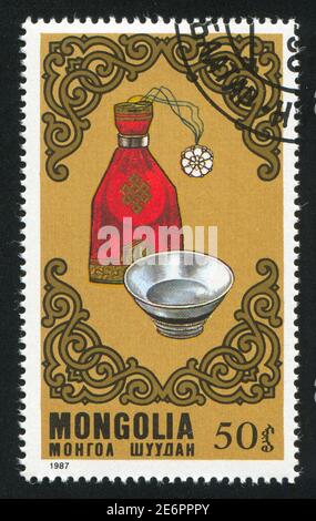 MONGOLIA - CIRCA 1987: stamp printed by Mongolia, shows Draw-string pouch, rice bowl, circa 1987 Stock Photo