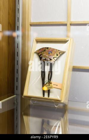 Gion District at night: Traditional Japanese hair comb in a window display Stock Photo