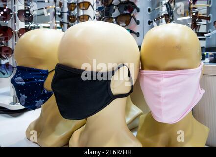 Voronezh, Russia - July 04, 2020: Reusable cloth masks worn on mannequin heads Stock Photo