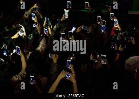 Mobile phones held up above the crowd as Jhene Aiko performs live at Koko, Camden, London. Stock Photo