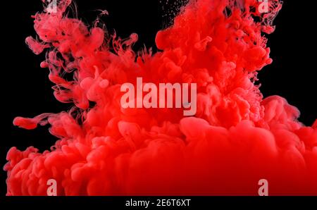 Red abstract background. Ink splashes in water on black Stock Photo