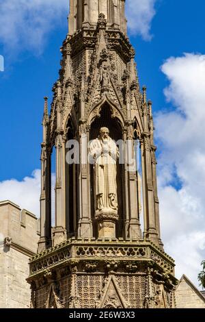 Hugh Latimer figure on the Martyrs' Memorial, a stone monument to 16th Century martyrs, Magdalen Street, Oxford, Oxfordshire, UK. Stock Photo
