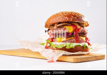 Fresh tasty burger isolated on white background Stock Photo