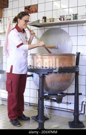 France, Bas Rhin, Ranrupt, Les Confitures du Climont, artisanal production of jams cooked in a copper cauldron with Perrine Hilberer Stock Photo