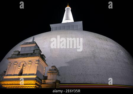 The Ruwanwelisaya glowing in the night, Stock Photo