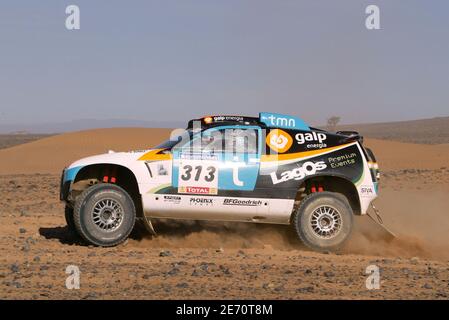 Portugal's Sousa drives his Volkswagen Race Touareg 2 in the desert at ...