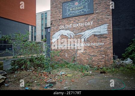 Mural on Pub wall : On the sixth day god created manchester ,Manchester, Uk Stock Photo