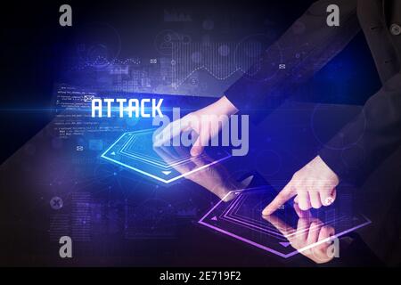 Hand touching digital table with ATTACK inscription, new age security concept Stock Photo