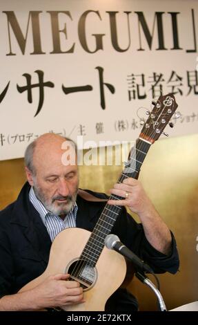 Folk singer Noel Paul Stookey sings 'Song for Megumi' at a news conference in Tokyo February 19, 2007. Megumi Yokota, who disappeared on her way home from school in 1977 at the age of 13, has become the iconic face of Japanese citizens abducted by Pyongyang's agents to help train spies during the 1970s and 1980s.  REUTERS/Kim Kyung-Hoon (JAPAN)