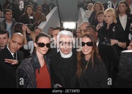 German designer Karl Lagerfeld flanked by Audrey marnay (L) and Joana Preiss poses backstage at the Chanel Fall-Winter 2007-2008 Ready-To-Wear collection show by German fashion designer Karl Lagerfeld, held at the Grand Palais, in Paris, France on March 2, 2007. Photo by Guignebourg-Khayat-Taamallah/ABACAPRESS.COM Stock Photo