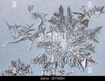 Ice crystals forming on glass Stock Photo