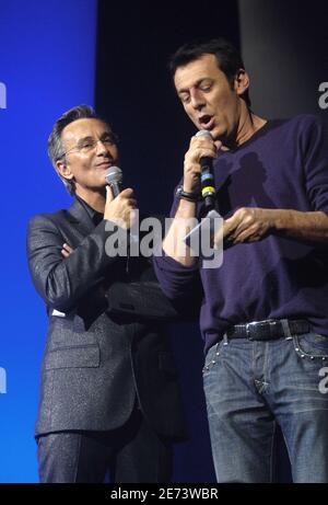 Presenters Laurent Petitguillaume and Jean-Luc Reichmann on stage at Le Zenith during the RFM Party 80, in Paris, France, on March 15, 2007. Photo by Giancarlo Gorassini/ABACAPRESS.COM Stock Photo