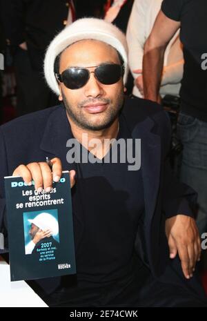 French singer Doc Gyneco poses during the Book Fair 'Le Salon Du Livre' held at Porte de Versailles, in Paris, France, on March 24, 2007. Photo by Denis Guignebourg/ABACAPRESS.COM Stock Photo