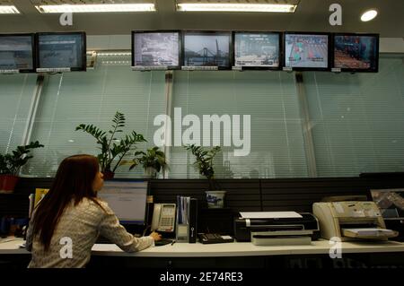 cctv screen. CCTV monitors in control room at Cardiff Central Police ...