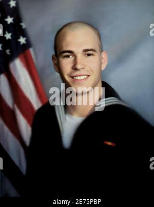 2005 , USA : The QAnon Shaman JACOB Anthony CHANSLEY aka JAKE ANGELI ( born 1987 , Phoenix , Arizona ) when was sailor in U.S. Navy service like SKSA ( Seaman Apprentice  Storekeeper Striker ). Photo from the original 2005 Cruise Book , portrait by official photographer of the Navy Service Base USS Kitty Hawk Aircraft ( CV 63 ) WestPac Cruise Book 2005-2006. American conspiracy theorist, actor,author, and activist who allegedly participated in the 2021 storming of the United States Capitol Hill . He is a supporter of former President Donald Trump and a proponent of the QAnon conspiracy Stock Photo